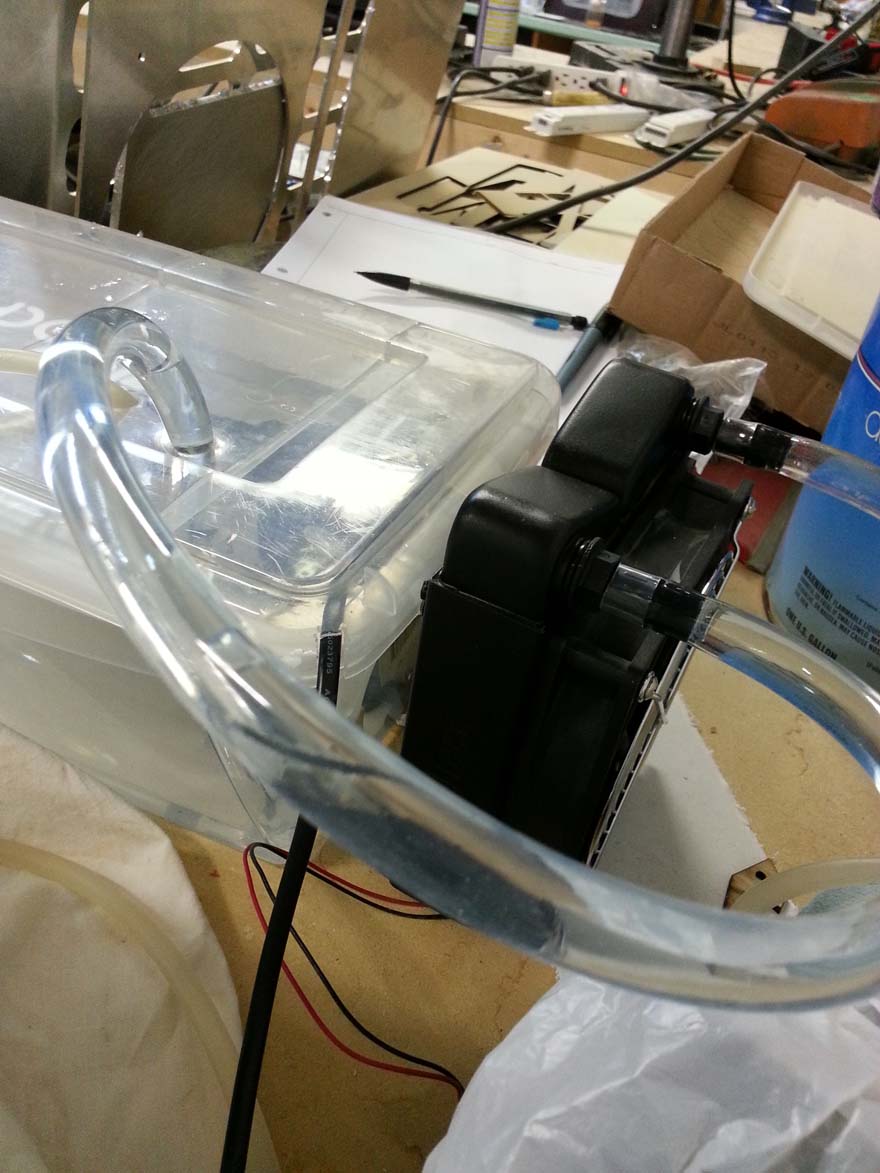 Completed water system, side view with reservoir and pump on left, radiator and fan on right